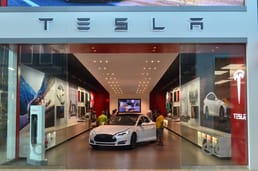 Tesla requires buyers to purchase cars online to circumvent state laws that require car sales to be done through franchise dealerships. "Tesla Stores" exist only to educate potential customers and to deliver vehicles purchased online.
