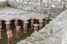 Wann wurde das erste zentrale Heizungssystem entwickelt?