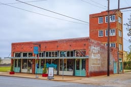 The World’s Littlest Skyscraper is Located in Wichita Falls and was Built in 1919. The Blueprints Indicated the Units were Inches and Not Feet. The Remote Investors were Practically Swindled.