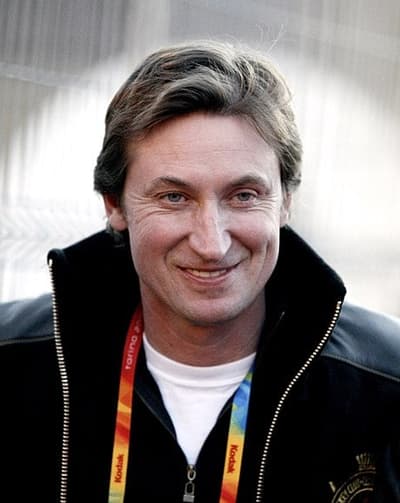 Wayne Gretzky is the only Hockey player to have scored over 200 points in a season, and did so a total of four times. His stunning success as a Hockey player was immortalized in the fact that not only did is own team retire 99, Gretzky's Jersey number, but the league as whole did as well!
