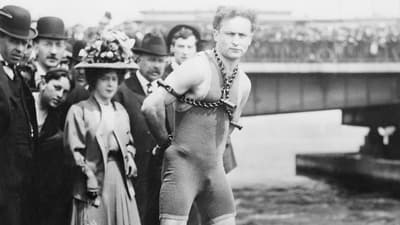 Why was Harry Houdini Skeptical of Spiritualists?