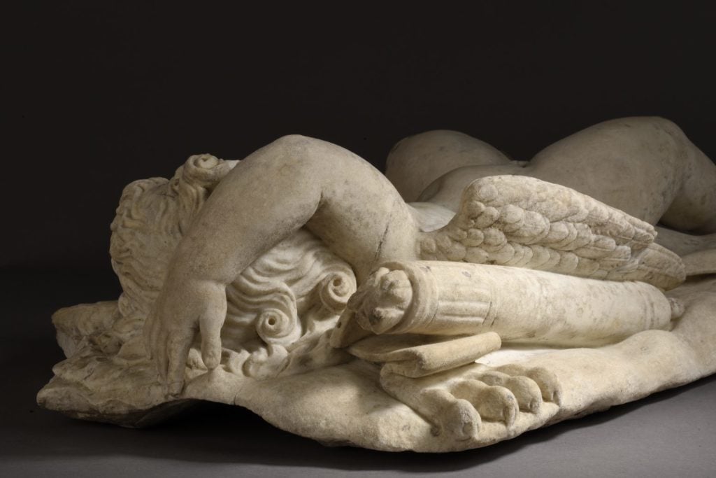 Michelangelo Created a Sleeping Cupid Figure and Treated it with Acidic Earth to Appear Ancient. He Then Sold it to a Dealer who Sold it to Cardinal Riario of San Giorgio. Later, They Found Out About the Fraud and Demanded a Refund. Michelangelo was Permitted to Keep His Share.