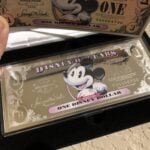 The Disney Dollar is Currency Created by The Disney Company for Use Within Their Theme Parks and Hotels. While You Can Still Redeem Them Today, The Official Printing Ended in 2016.